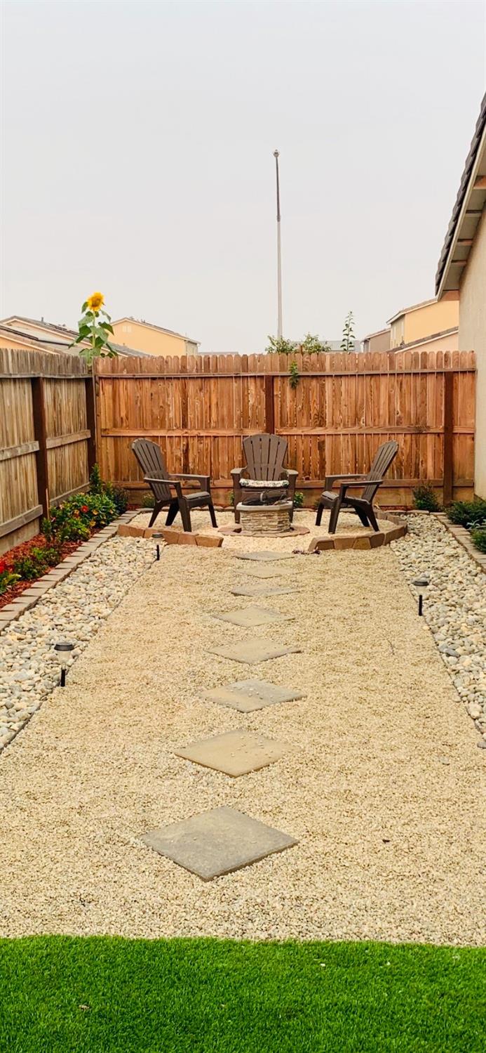 356 Solano Street Madera, CA 93638 - Photo 15 of 15 a view of a terrace with a bench