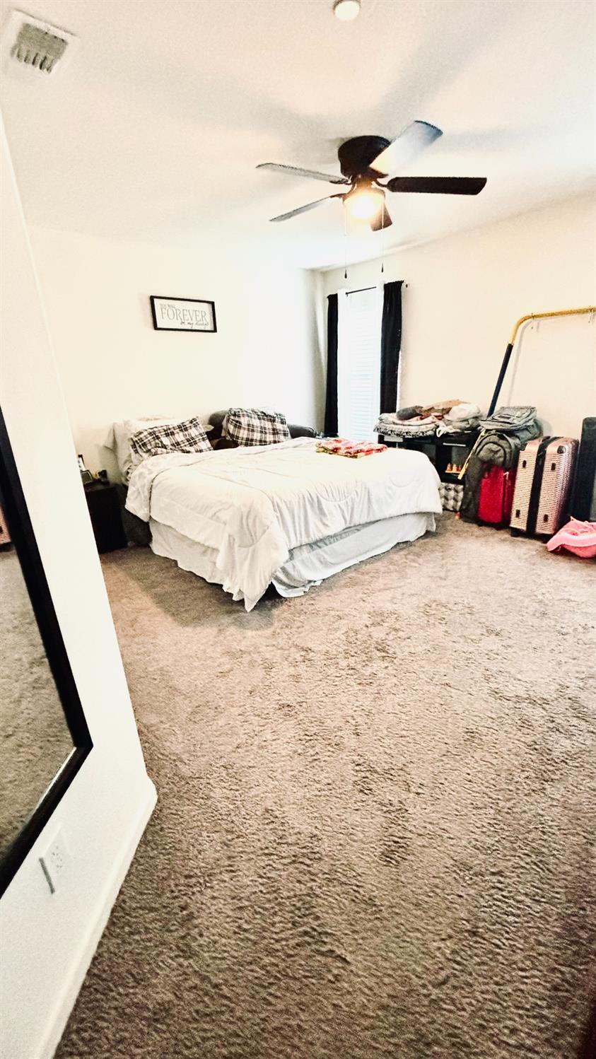 356 Solano Street Madera, CA 93638 - Photo 8 of 15 a bed room with a bed