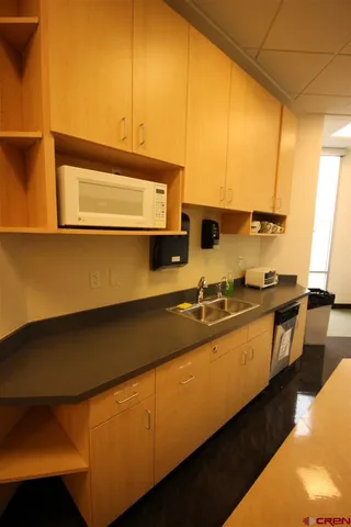 a view of a park with sitting area