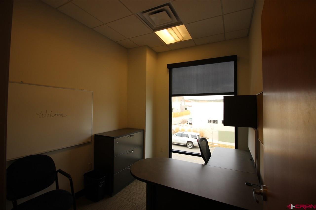 175 Mercado Street, Unit 260 Durango, CO 81301 - Photo 7 of 21 a view of workspace with wooden floor windows