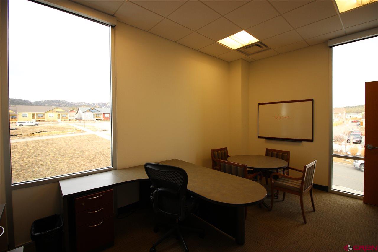 175 Mercado Street, Unit 260 Durango, CO 81301 - Photo 9 of 21 a workspace with furniture and window