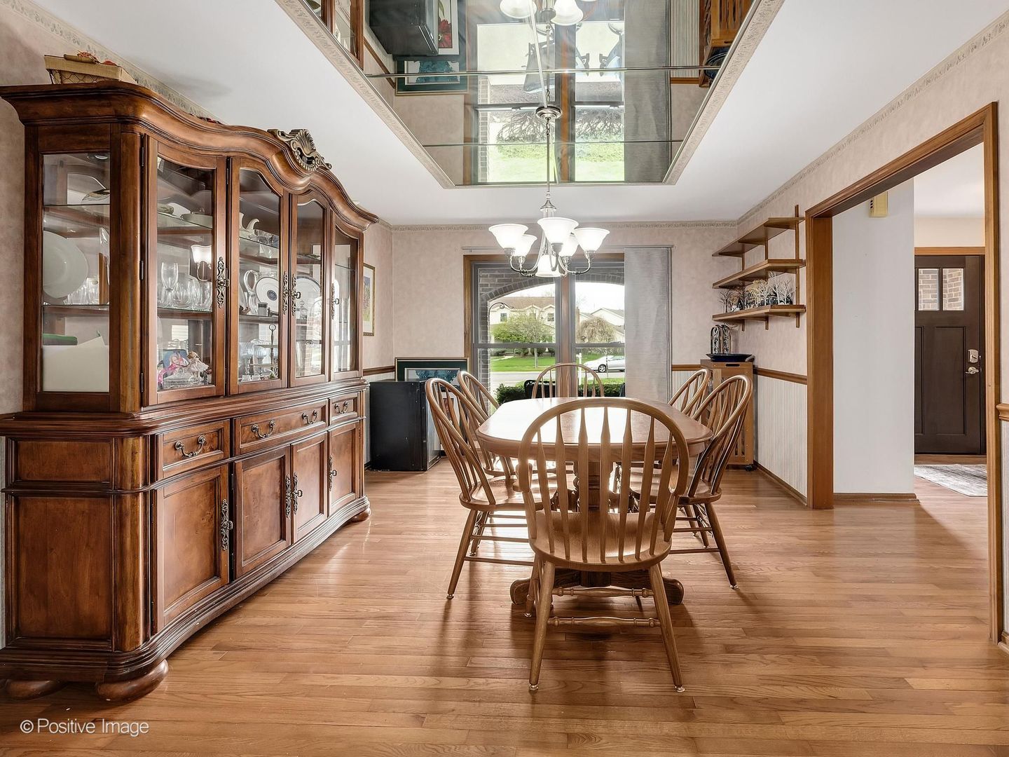 612 Stuart Drive Carol Stream, IL 60188 - Photo 7 of 29 a view of a dining room with furniture window and wooden floor
