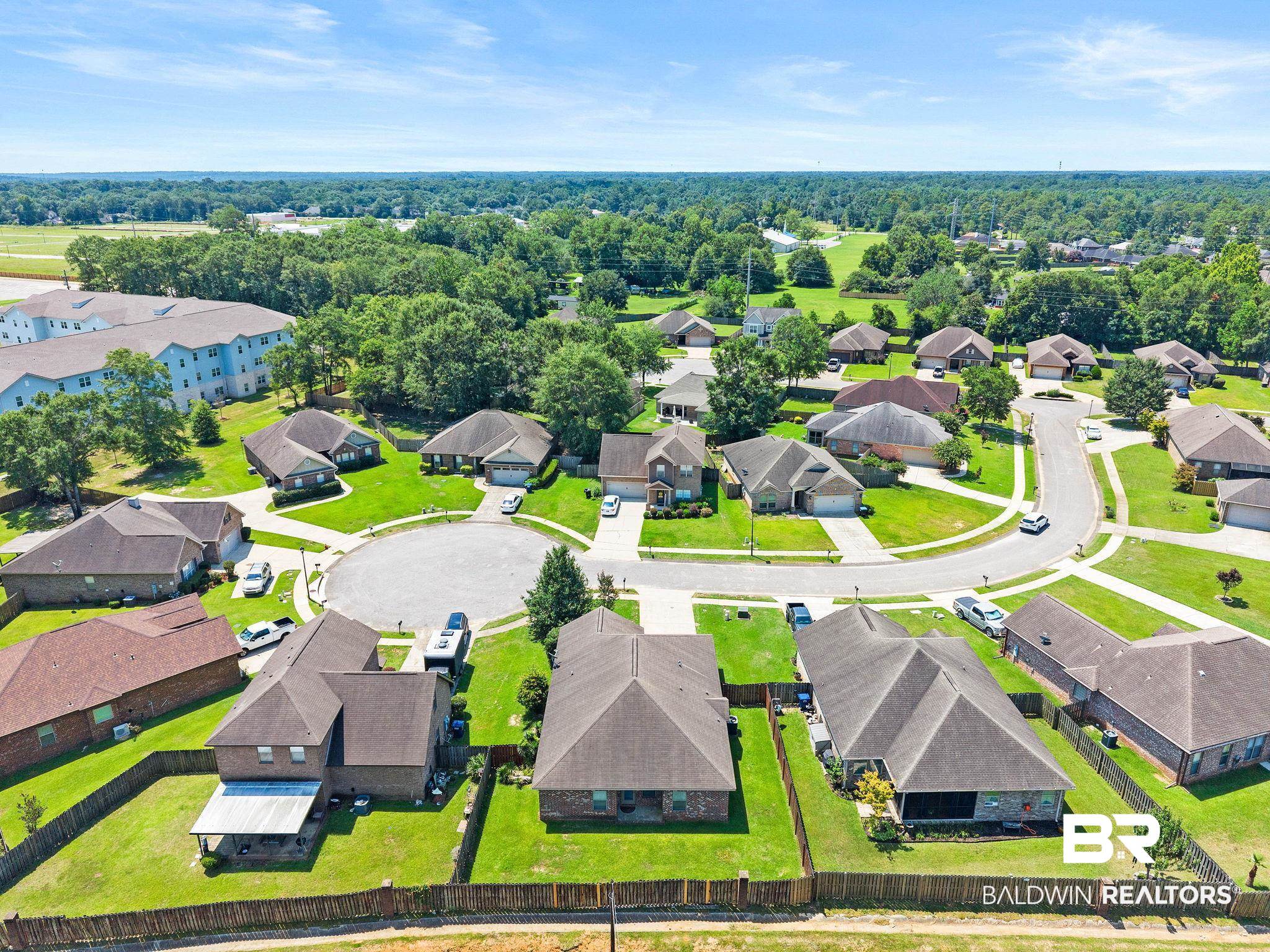 2216 Livingstone Court Mobile, AL 36695 - Photo 54 of 62 Aerial perspective showcasing a residential development with cul-de-sac streets and individual properties featuring fenced yards