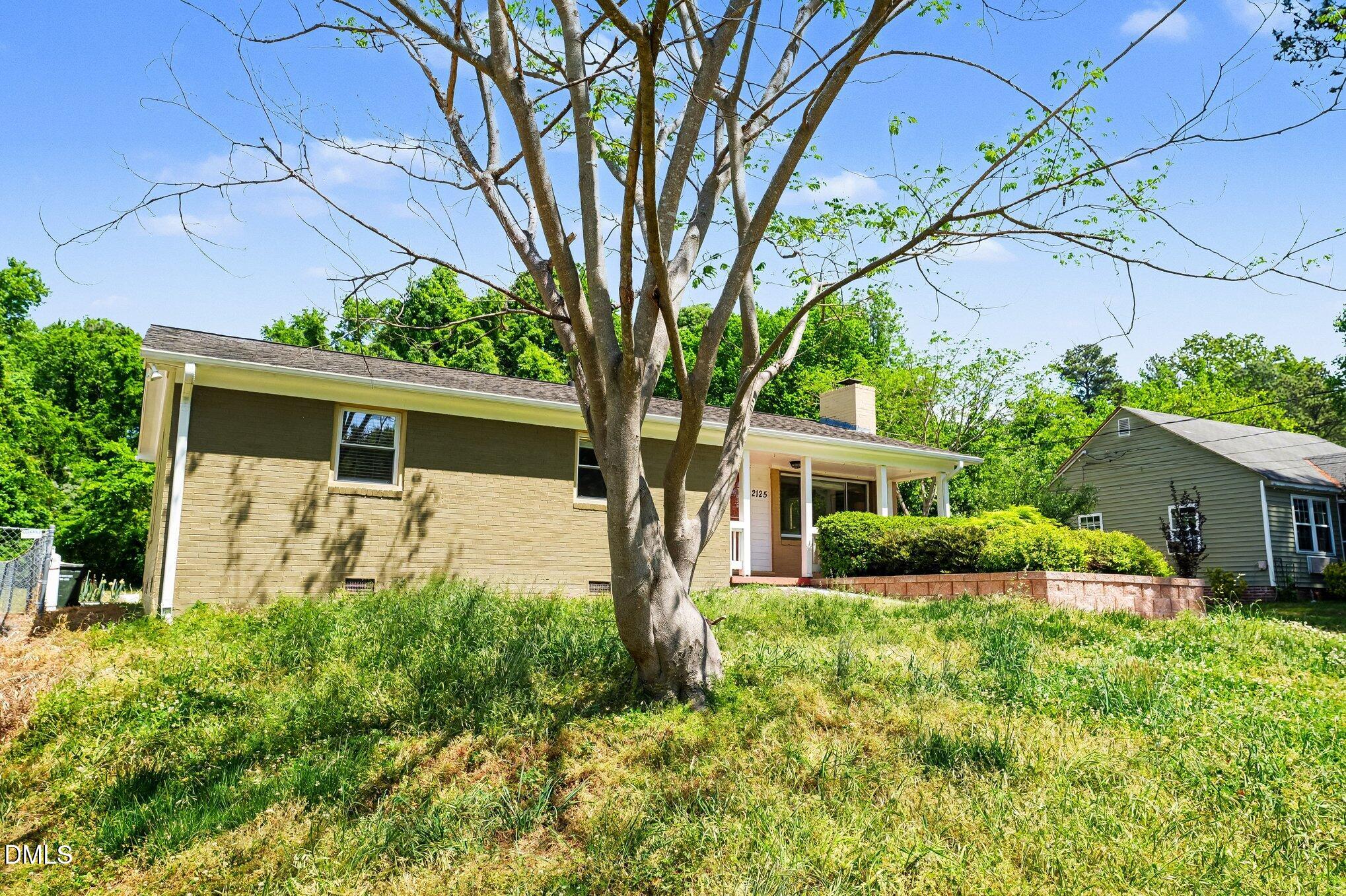2125 Cheek Road Durham, NC 27704 - Photo 2 of 24 front view of house with a yard