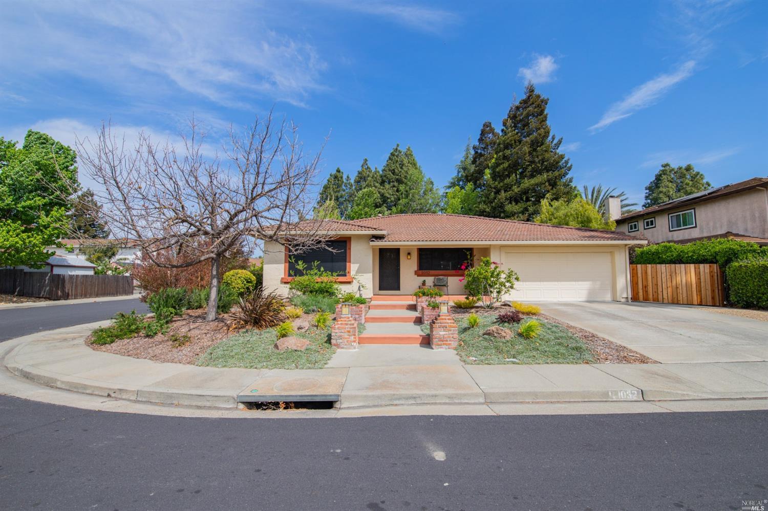 front view of a house with a patio