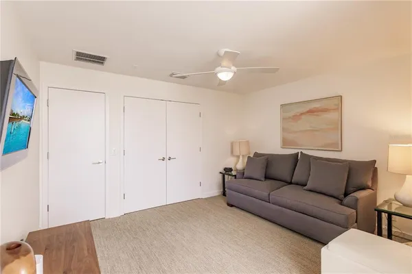 a living room with furniture and a couch