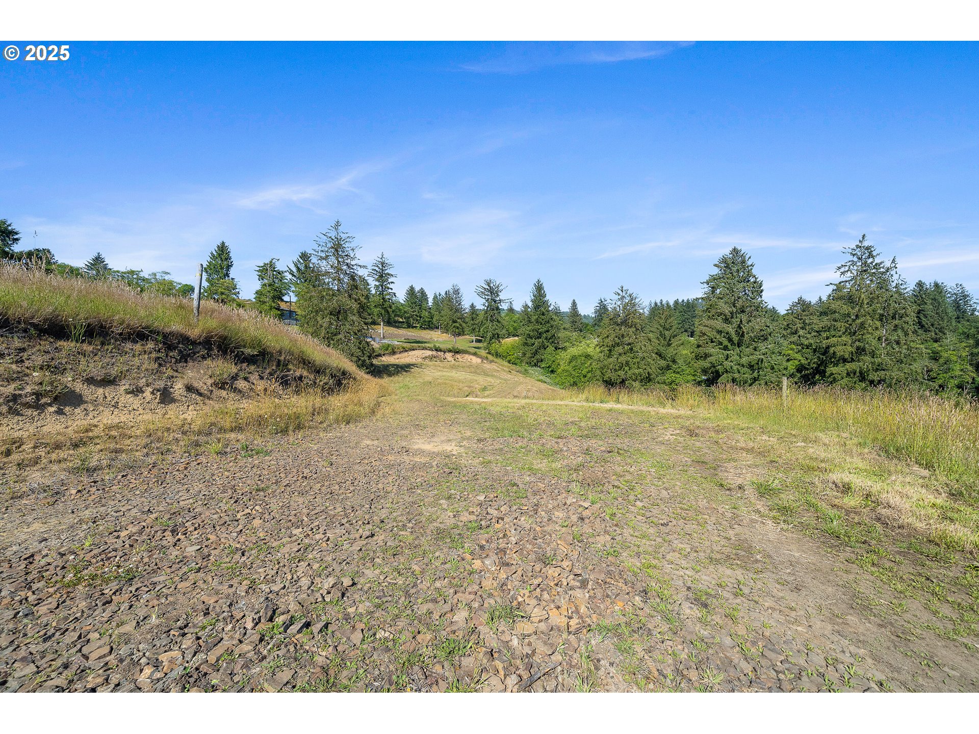 Edelwyss Road, Unit 405 Tillamook, OR 97141 - Photo 8 of 12 a view of a lake with houses in the background