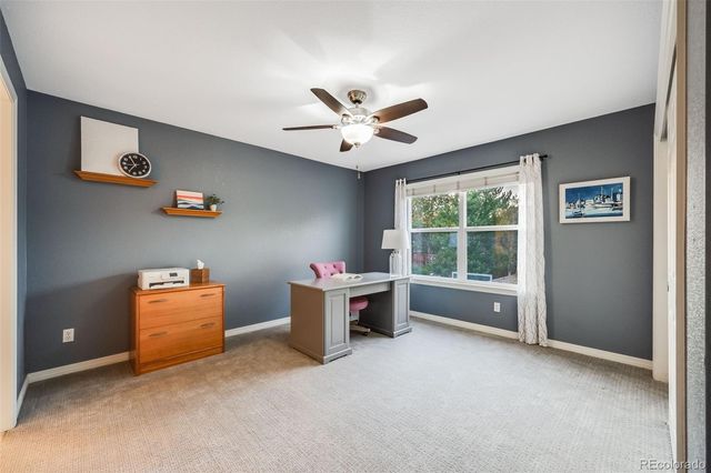 a room with furniture and a window