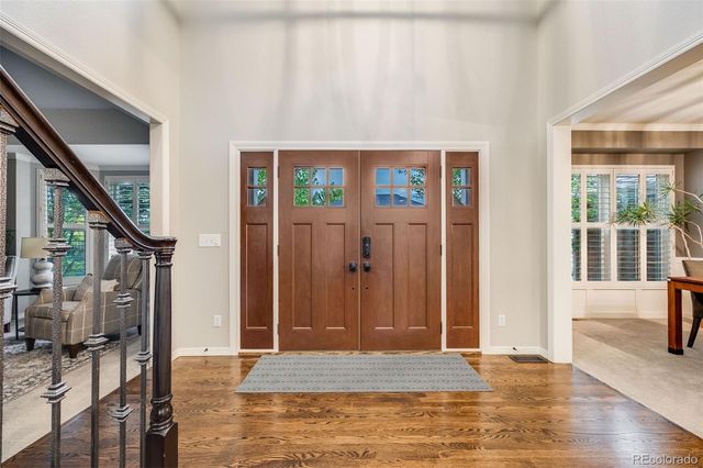 a view of an entryway with livingroom