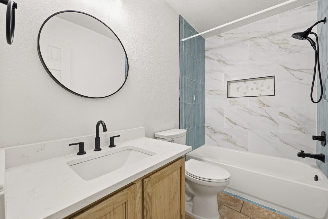 125 Blue Ridge Trail Elgin, TX 78621 - Photo 17 of 27 Updated 2nd bath with vanity and shower / bath combination