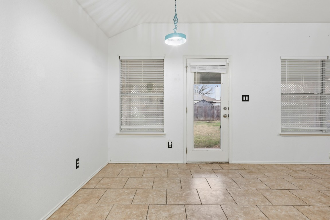 125 Blue Ridge Trail Elgin, TX 78621 - Photo 5 of 27 Unfurnished dining area with vaulted ceiling