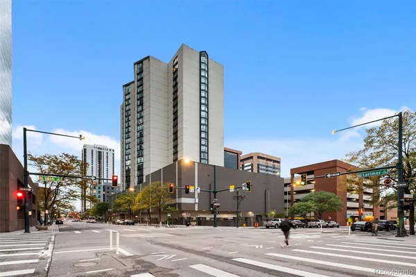 a front view of a building with street view