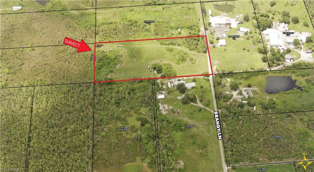 Brandy Lane Naples, FL 34114 - Photo 1 of 2 a bathroom with a shower and a sink