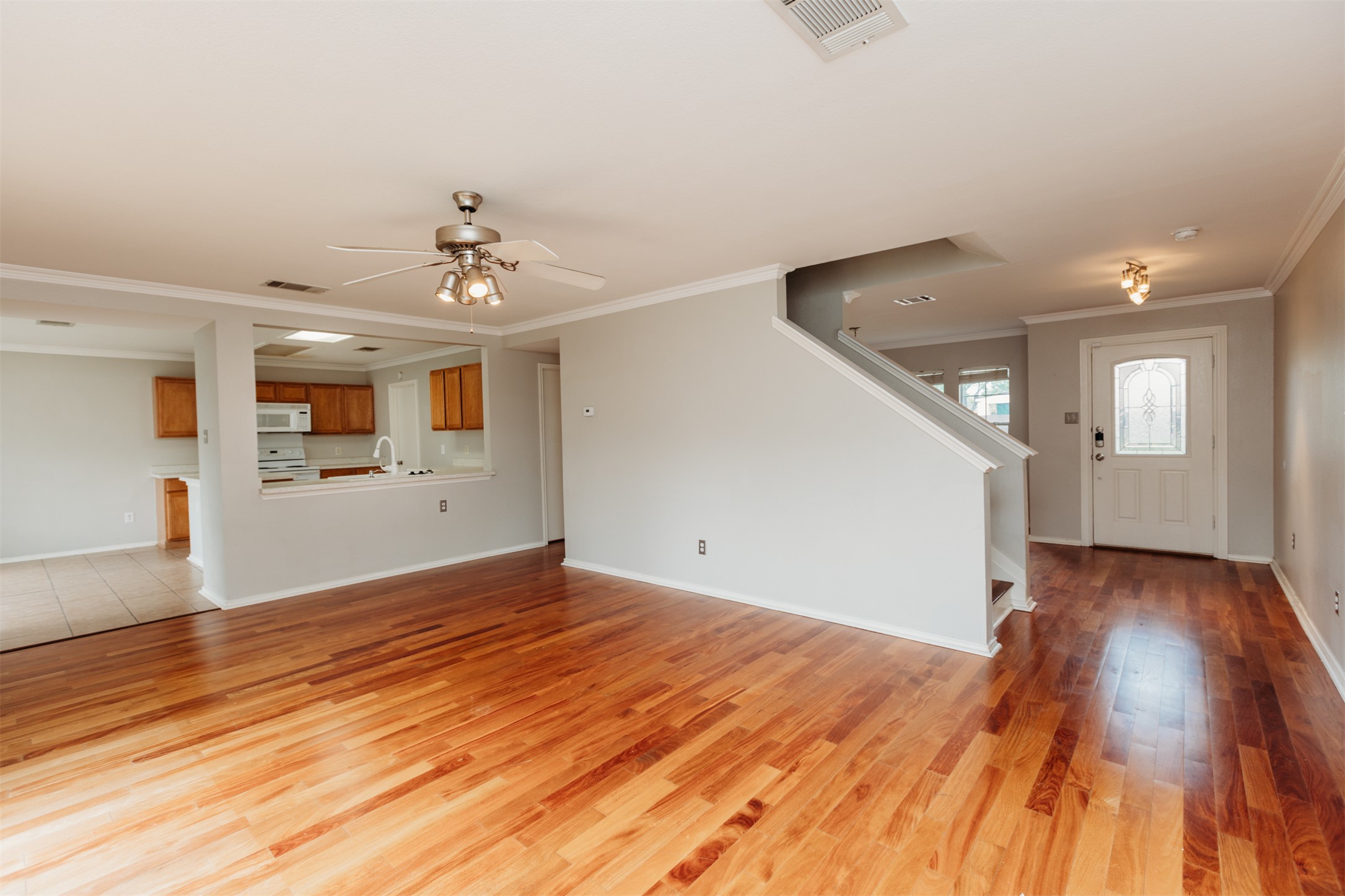 1101 Sheltie Lane Round Rock, TX 78664 - Photo 4 of 22 wooden floor in an empty room with a window