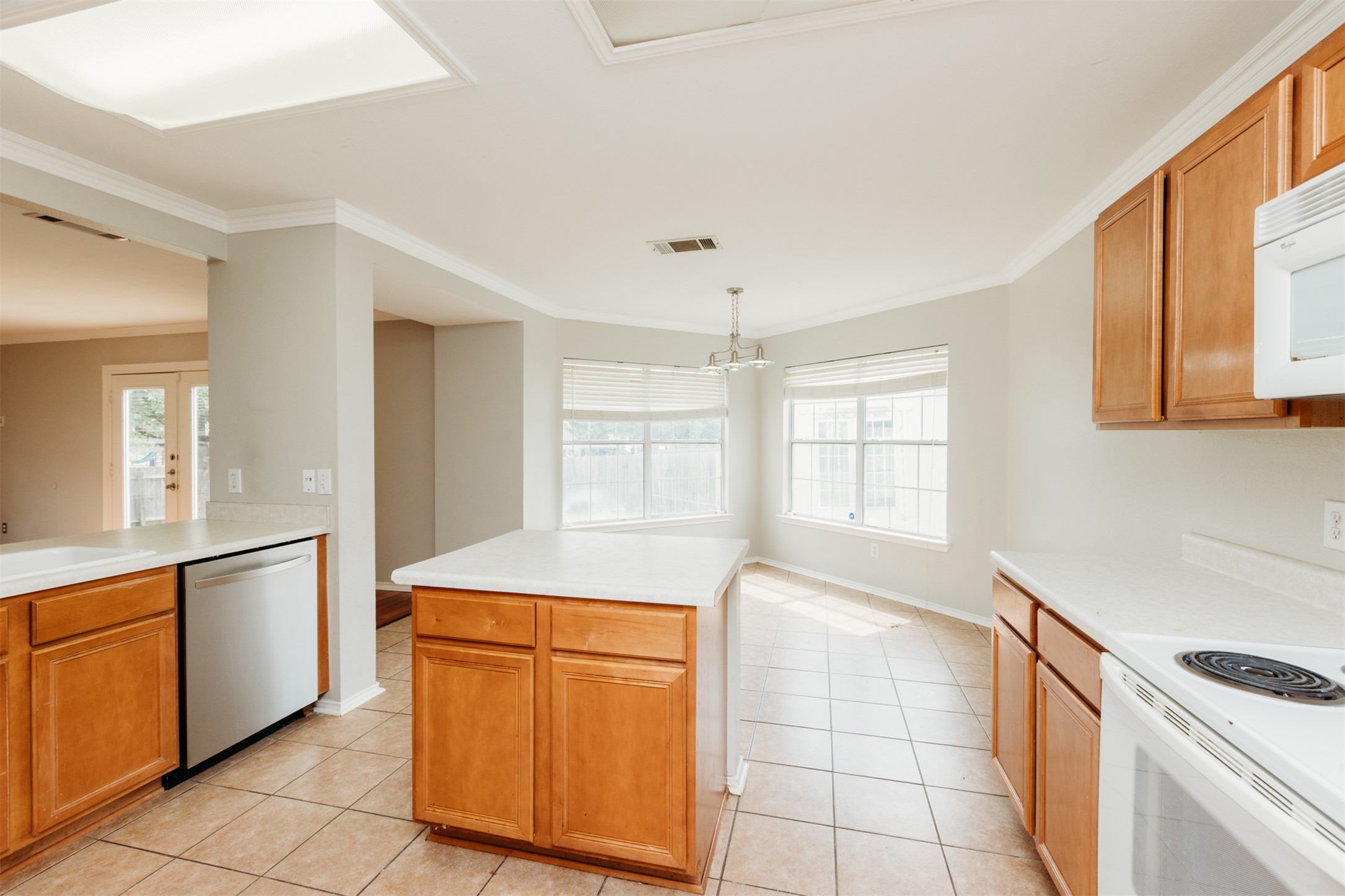 1101 Sheltie Lane Round Rock, TX 78664 - Photo 9 of 22 a kitchen with a stove and a refrigerator