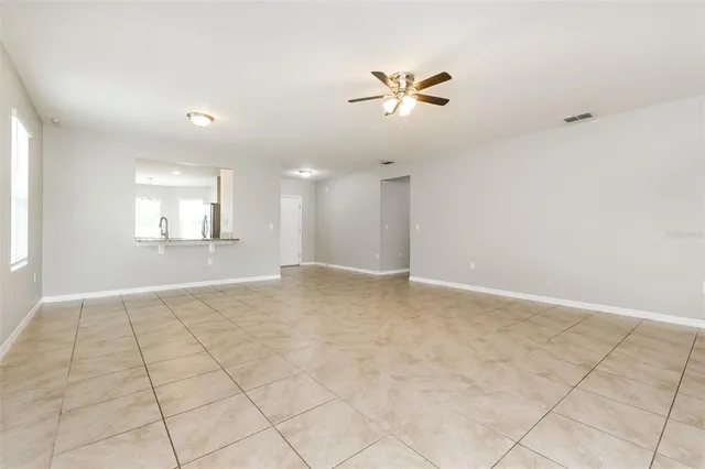 a view of an empty room and window