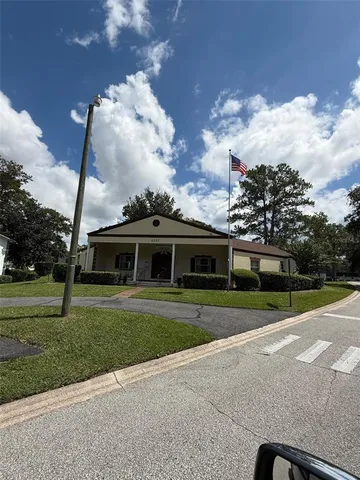 a view of a house with a big yard