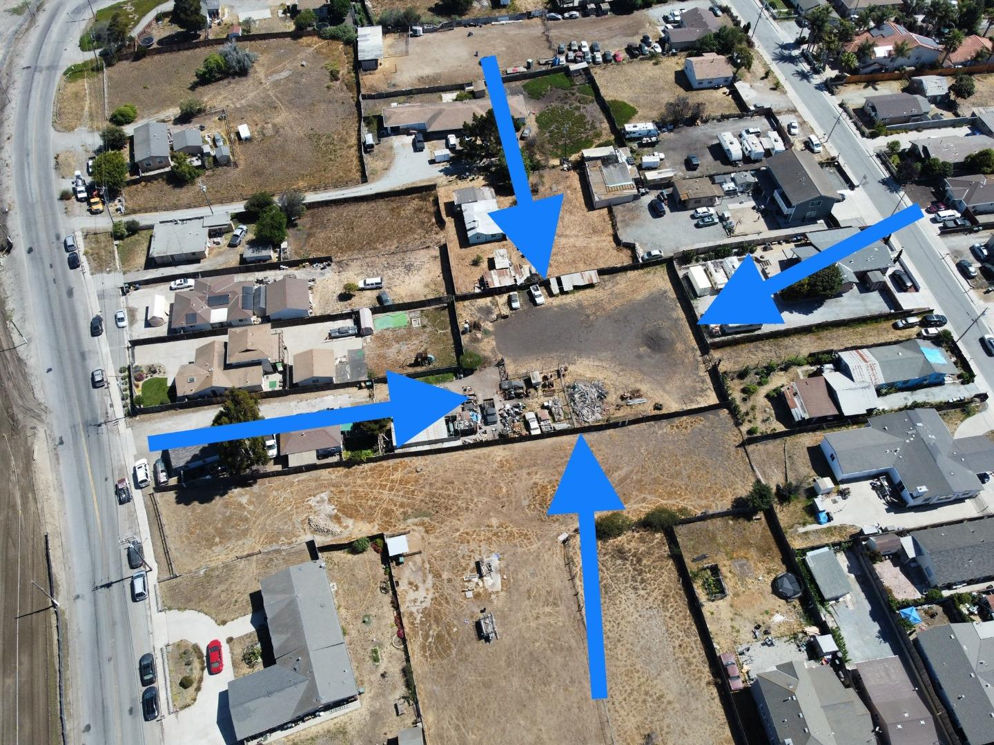 an aerial view of a houses with outdoor space