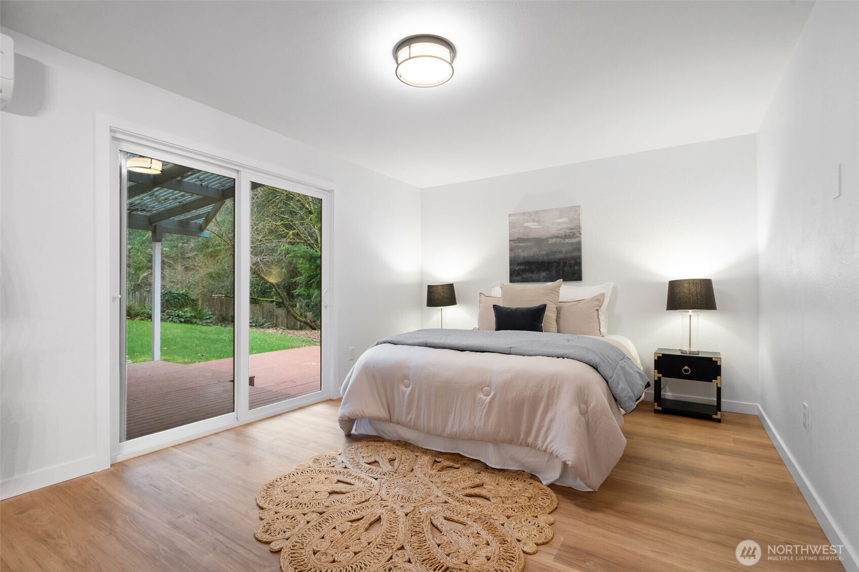 13080 Old Military Road Northeast Poulsbo, WA 98370 - Photo 15 of 29 a bed room with a bed and a view of bedroom
