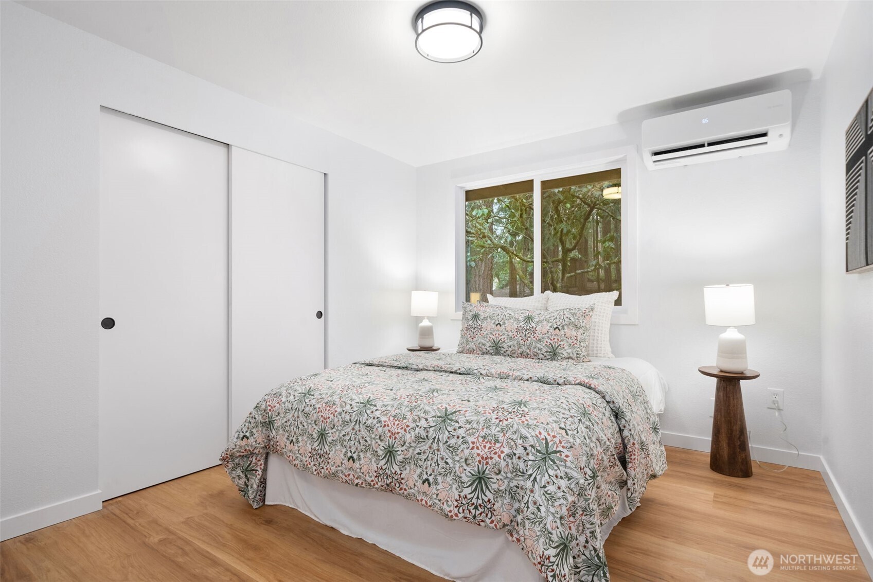 13080 Old Military Road Northeast Poulsbo, WA 98370 - Photo 16 of 29 a bedroom with a bed and a window