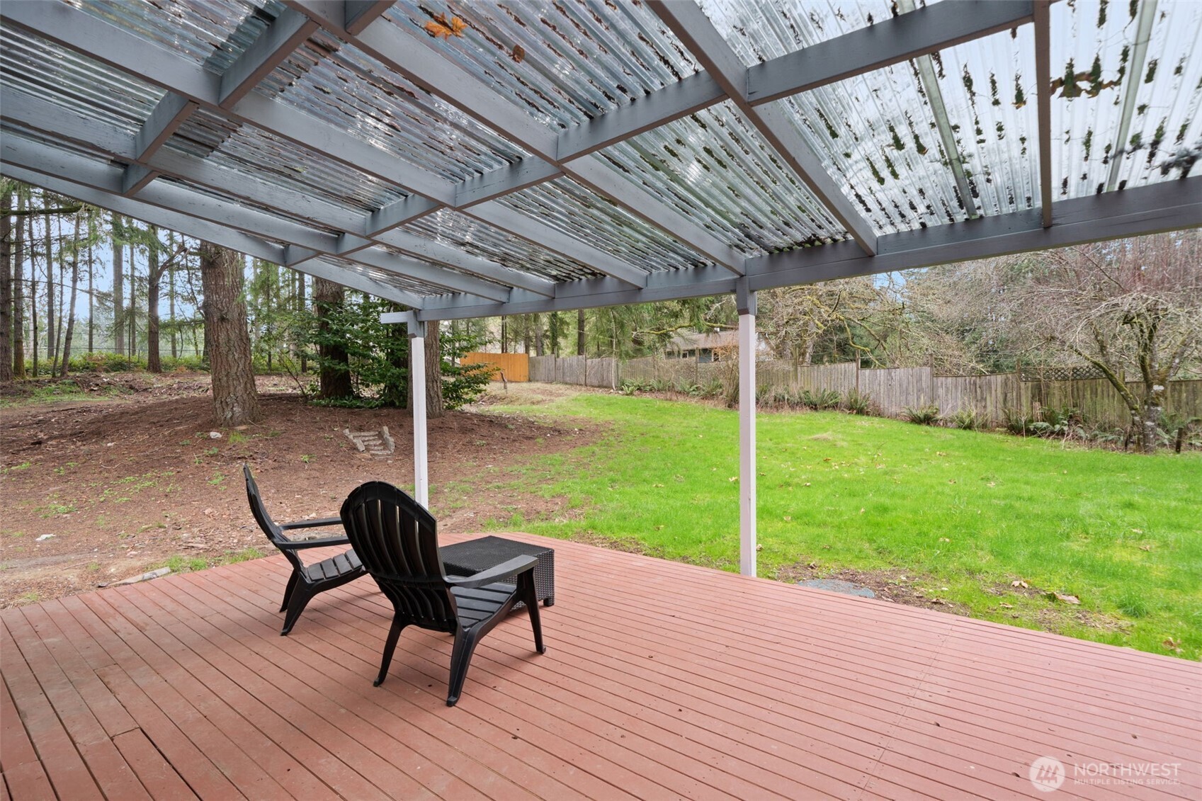 13080 Old Military Road Northeast Poulsbo, WA 98370 - Photo 20 of 29 a view of a couches in patio with a yard