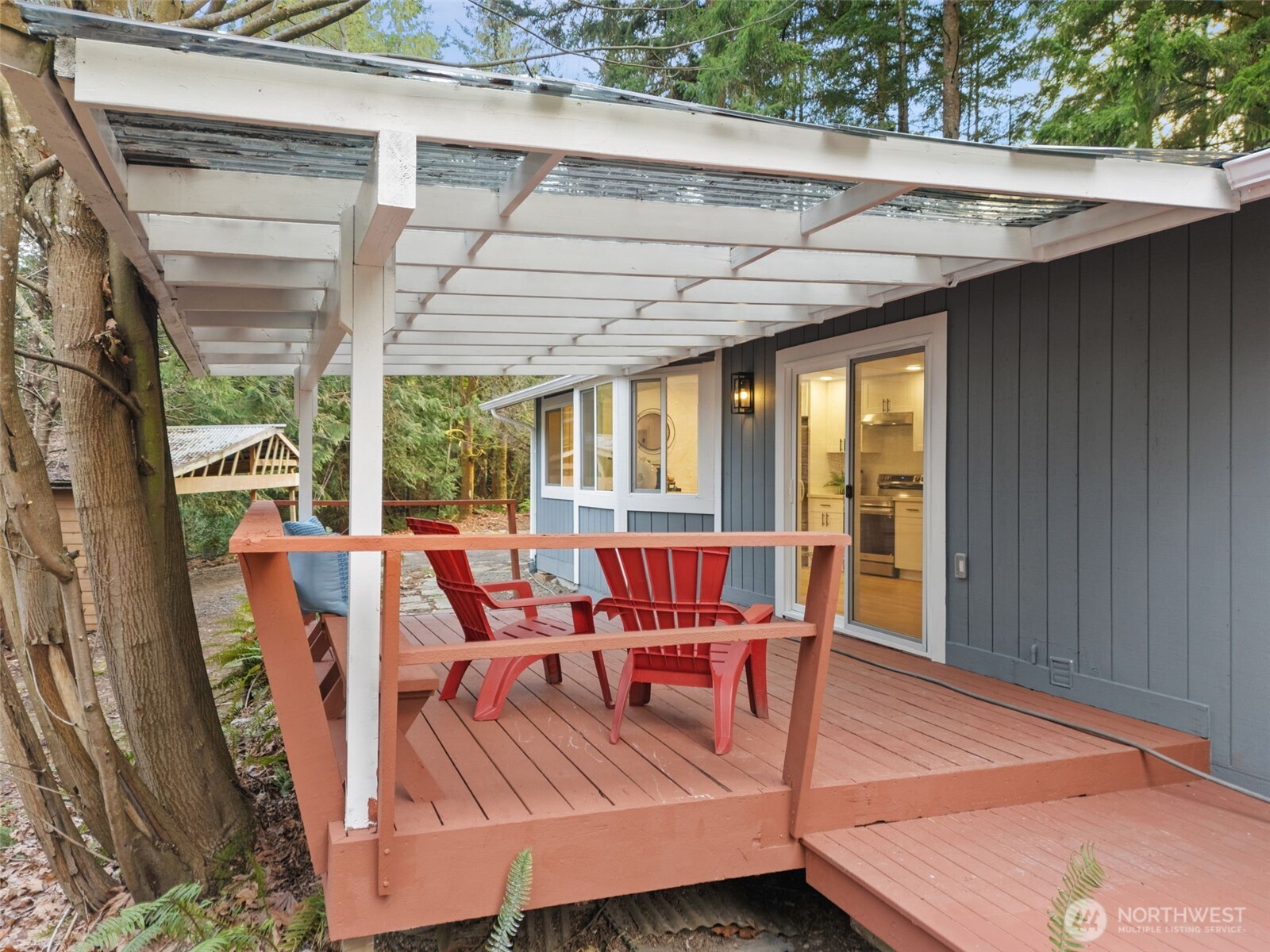 13080 Old Military Road Northeast Poulsbo, WA 98370 - Photo 23 of 29 a view of balcony with furniture and outdoor space