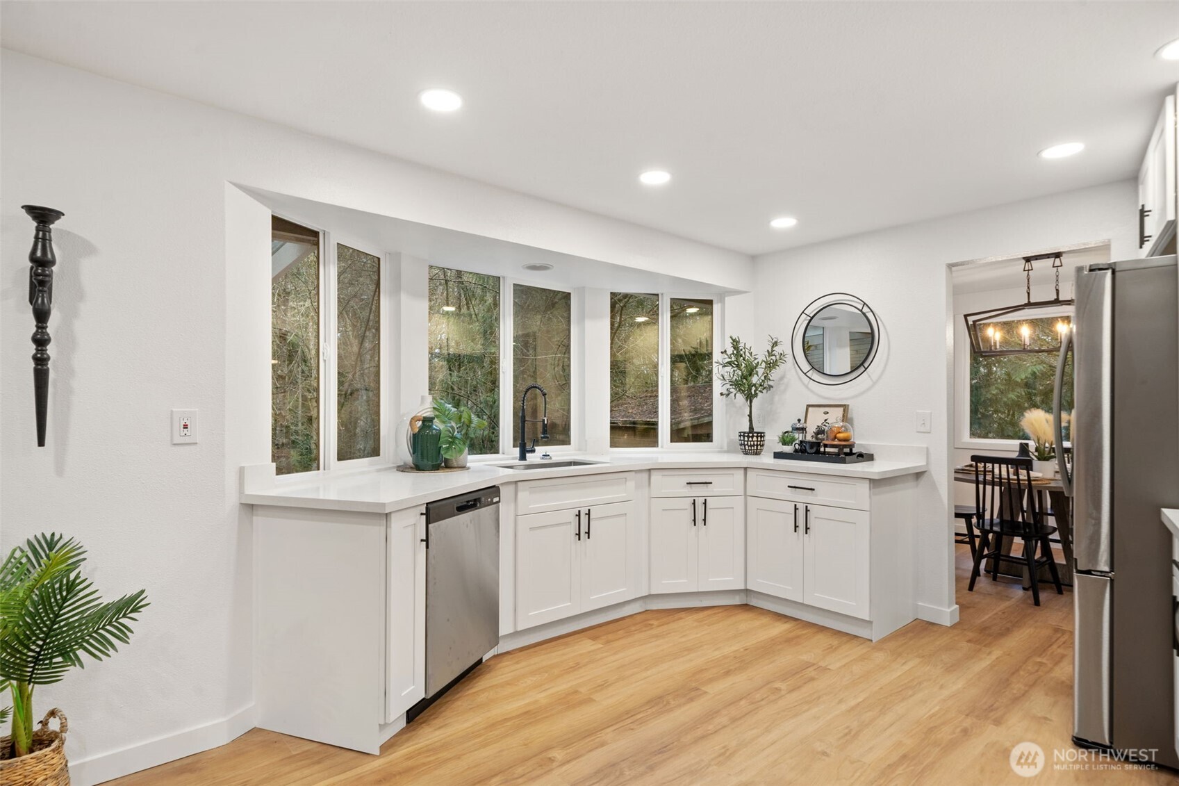 13080 Old Military Road Northeast Poulsbo, WA 98370 - Photo 9 of 29 a kitchen with a sink stove and cabinets