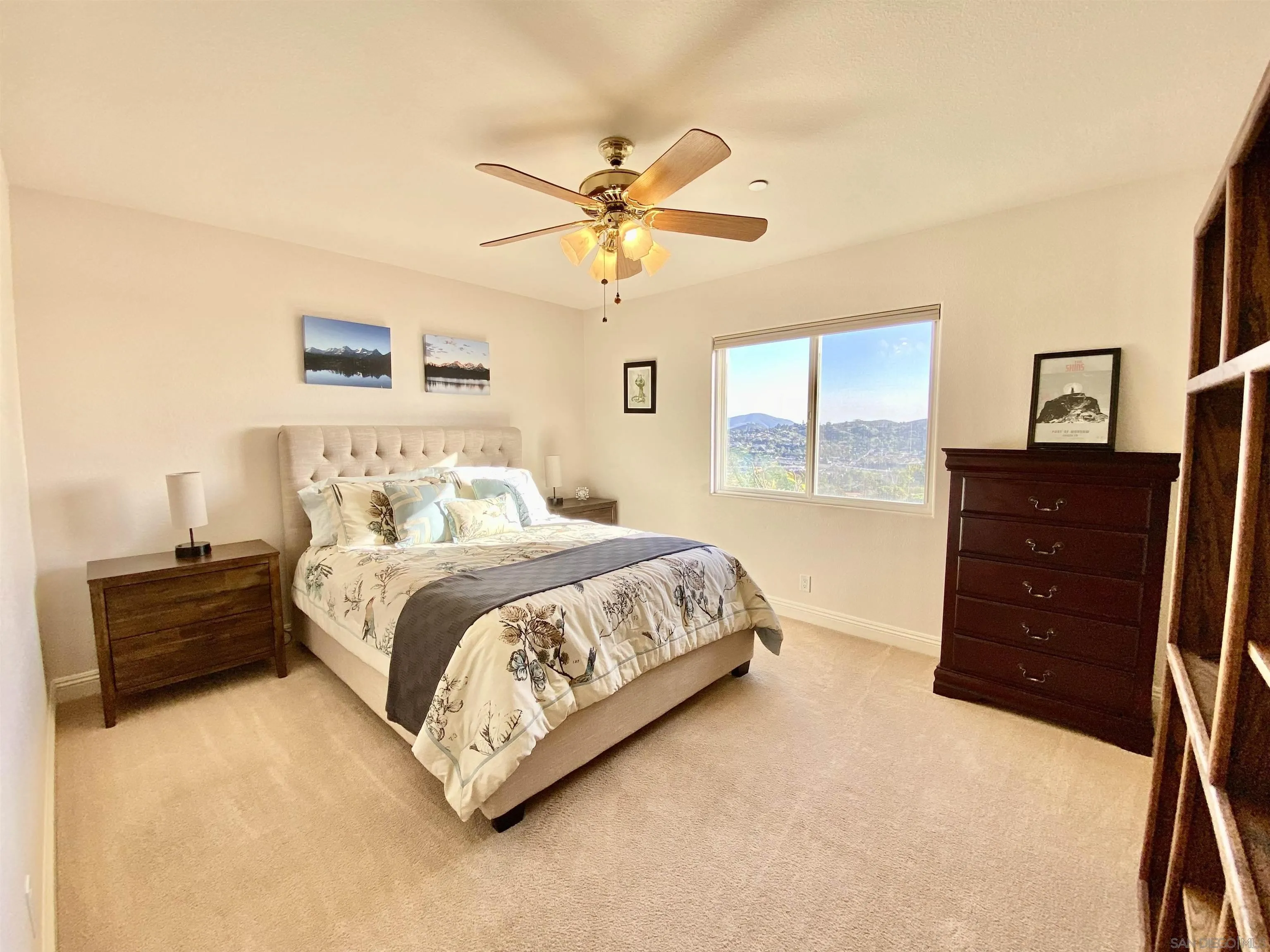 4375 North Rogers Road Spring Valley, CA 91977 - Photo 21 of 34 a bedroom with a bed and a dresser