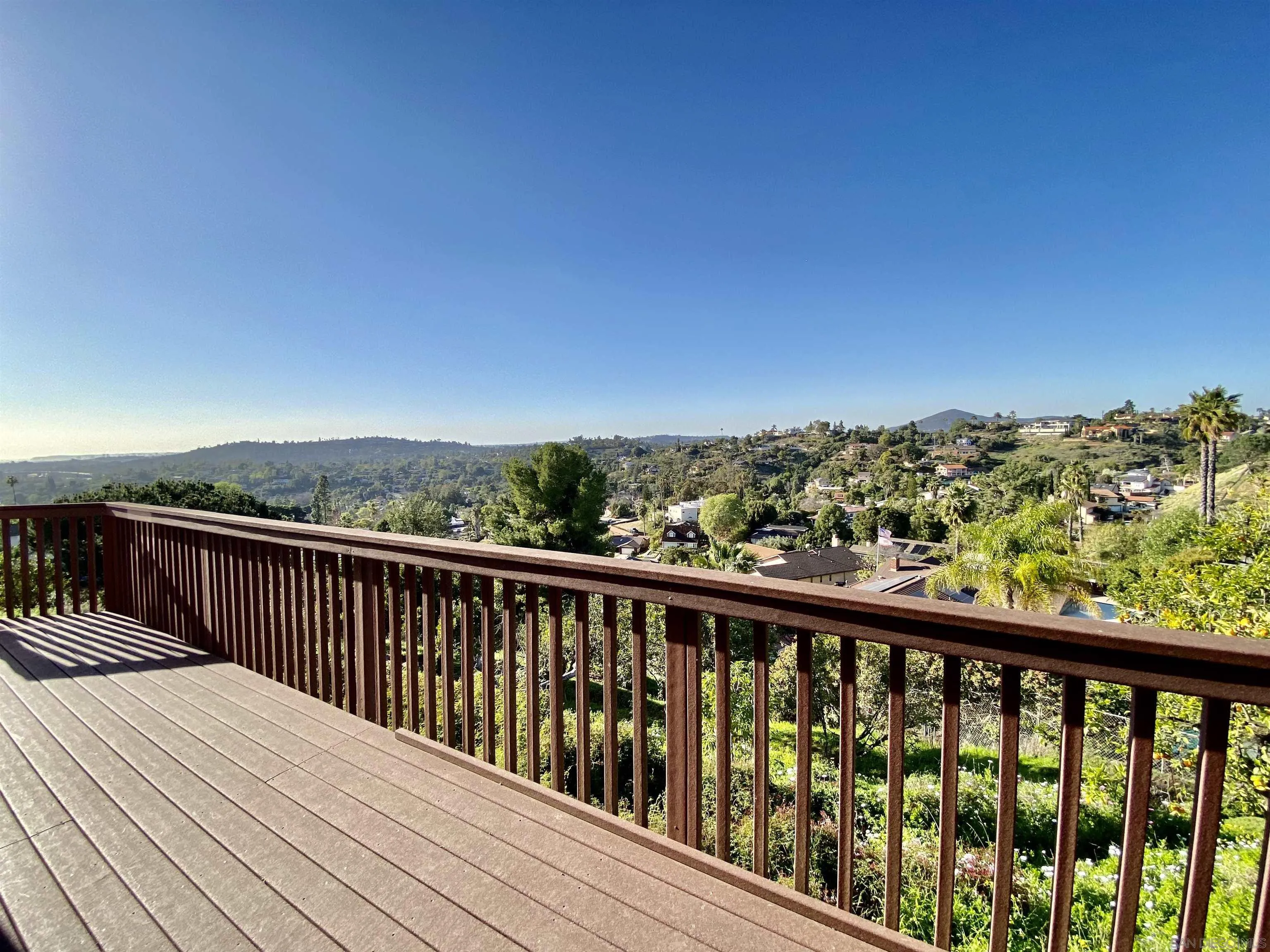 4375 North Rogers Road Spring Valley, CA 91977 - Photo 28 of 34 a balcony with wooden floor and city view