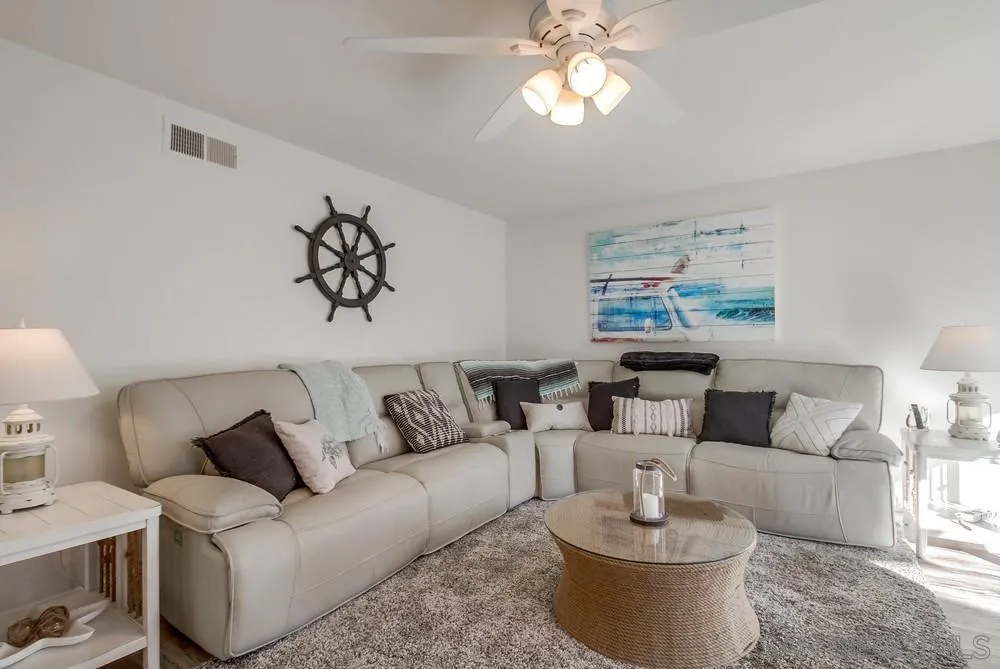 10 GingerTree Lane Coronado, CA 92118 - Photo 12 of 68 a living room with furniture and a large window