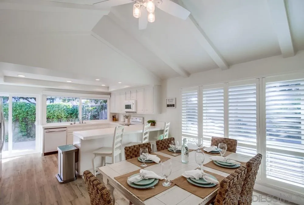 10 GingerTree Lane Coronado, CA 92118 - Photo 17 of 68 a living room with furniture and large windows