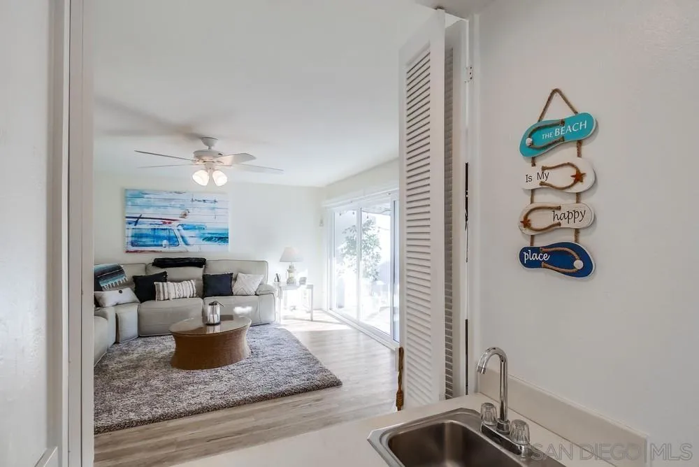 10 GingerTree Lane Coronado, CA 92118 - Photo 21 of 68 a living room with furniture and a flat screen tv