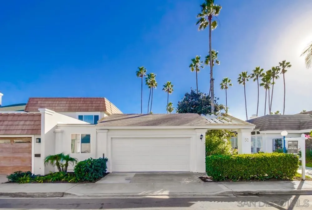 10 GingerTree Lane Coronado, CA 92118 - Photo 4 of 68 a front view of a house with a garden