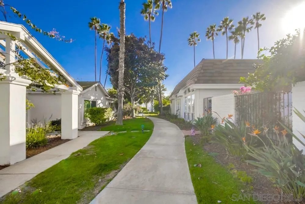 10 GingerTree Lane Coronado, CA 92118 - Photo 6 of 68 a front view of a house with a yard