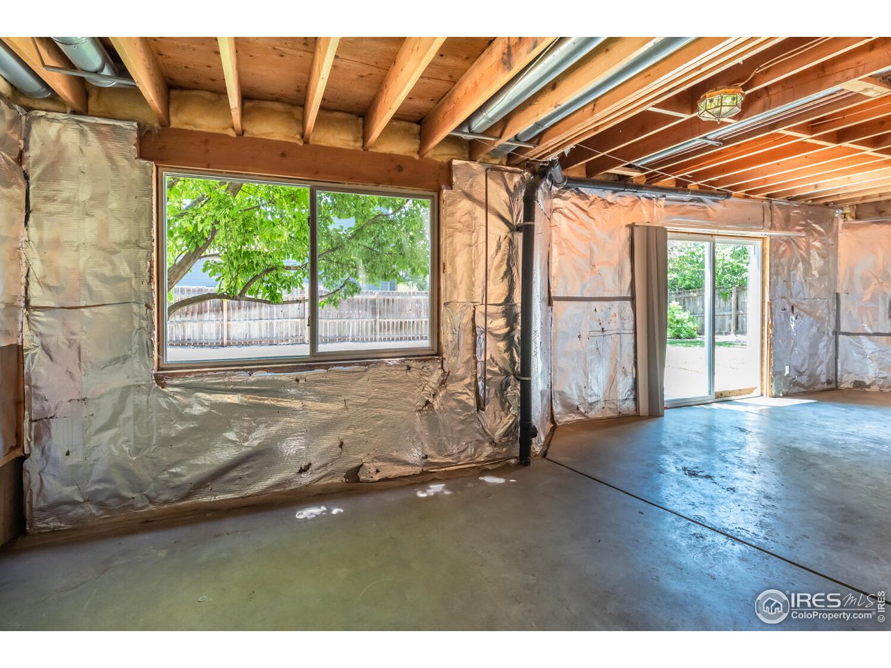 1907 Red Cloud Road Longmont, CO 80504 - Photo 23 of 31 Walk out lower level. So much potential for your finishing touches. Rough-ins for a 4th bathroom.