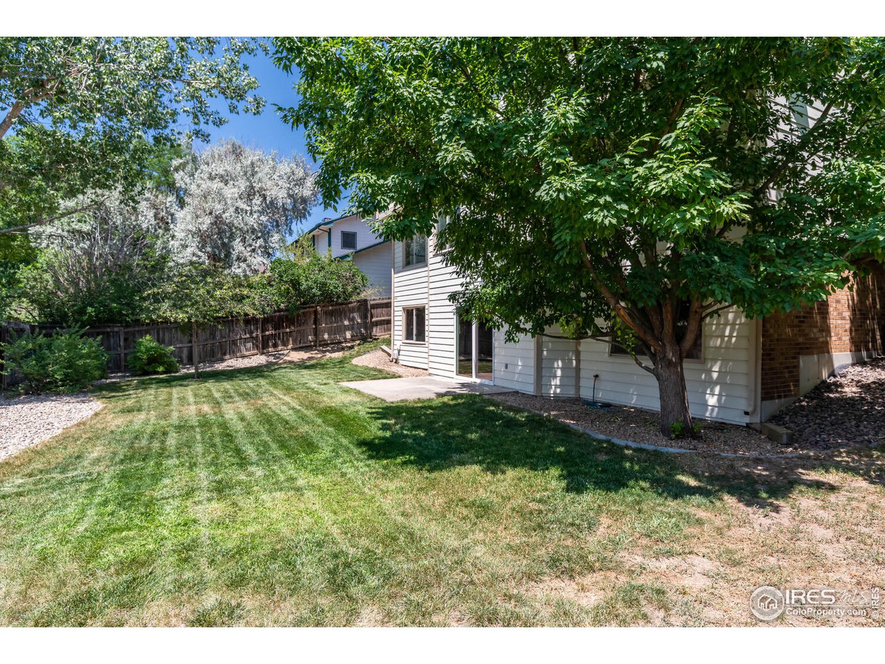 1907 Red Cloud Road Longmont, CO 80504 - Photo 27 of 31 Large backyard with privacy fence.