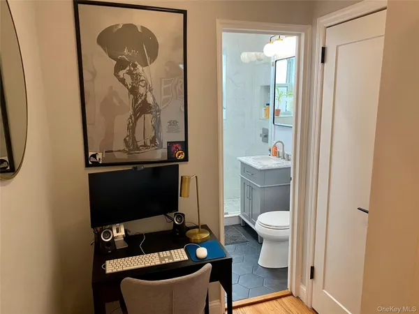 a bathroom with a toilet and a shower curtain