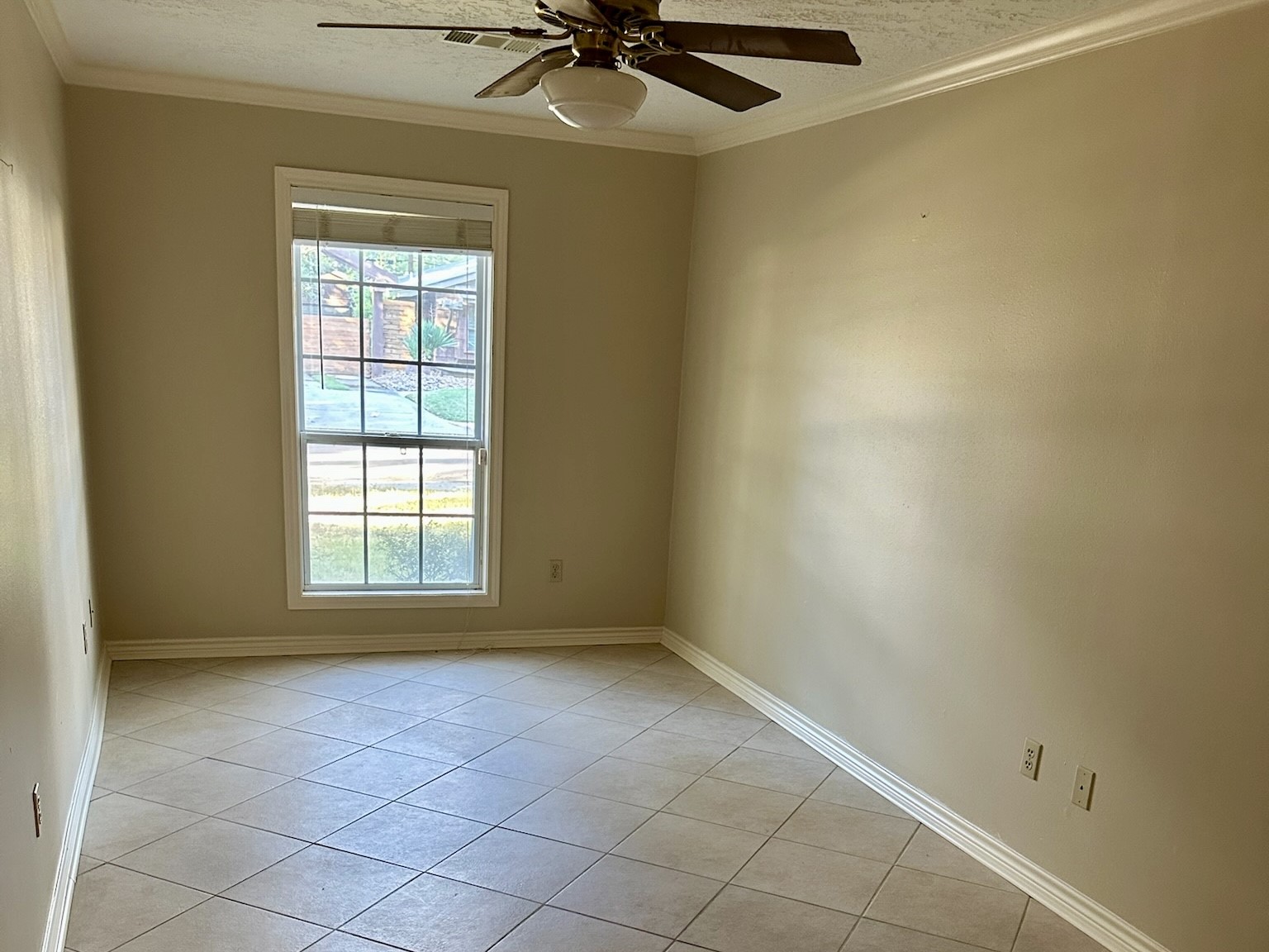 5659 Lymbar Drive Houston, TX 77096 - Photo 11 of 26 an empty room with a empty space and windows