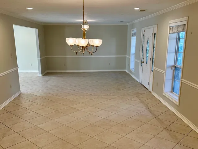 a view of a livingroom and a chandelier