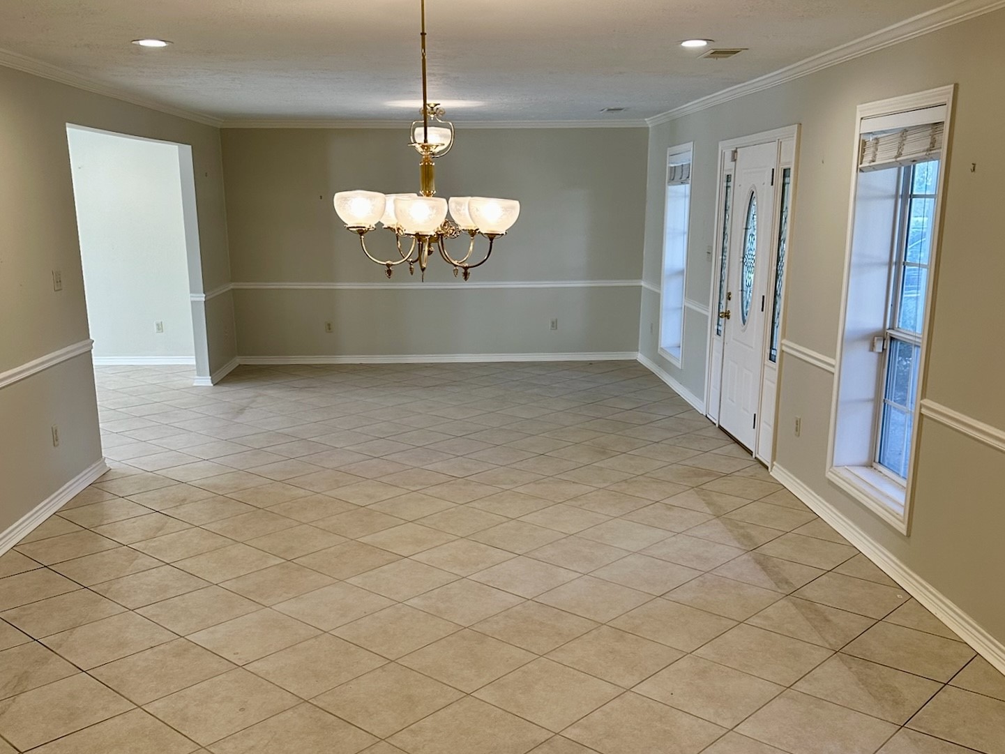 5659 Lymbar Drive Houston, TX 77096 - Photo 2 of 26 a view of a livingroom and a chandelier