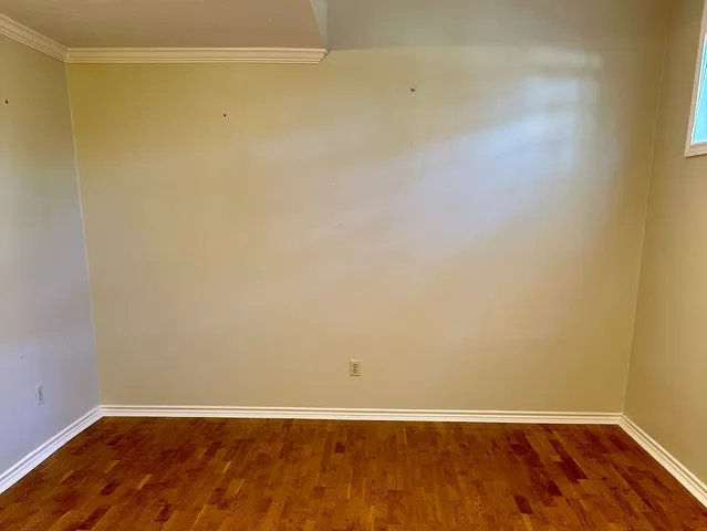 a bathroom with a toilet a sink and a mirror