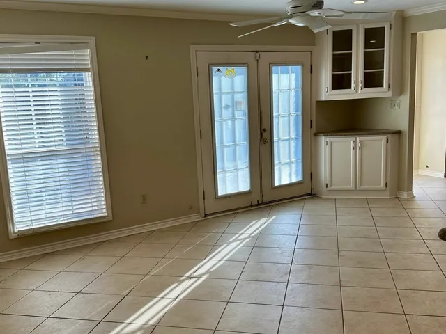 a view of a brick house with a door