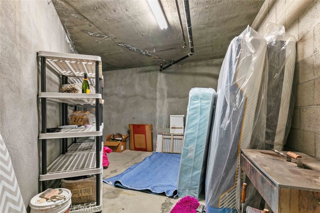 6939 Greeley Street, Unit 102 Tujunga, CA 91042 - Photo 16 of 19 a balcony with furniture and a potted plant