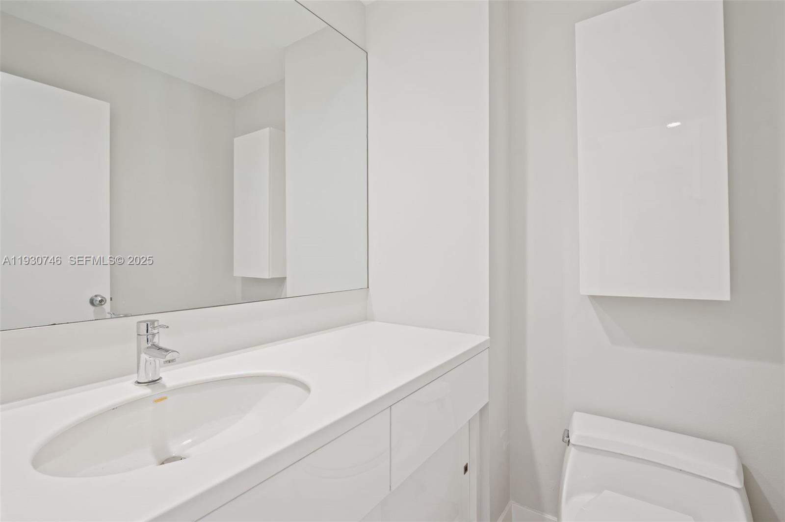 888 Brickell Key Drive, Unit 601 Miami, FL 33131 - Photo 8 of 42 Guest Bathroom