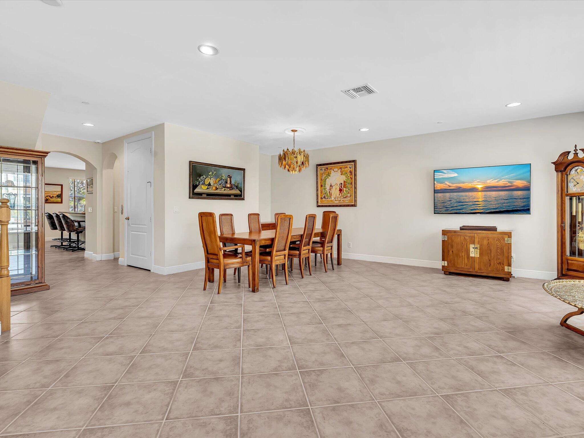 5575 Northeast Trieste Way Boca Raton, FL 33487 - Photo 14 of 38 Main floor living/dining
