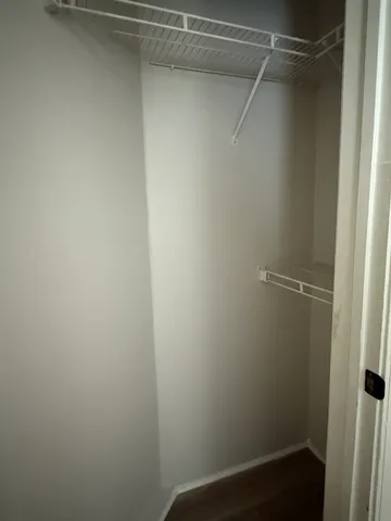 a view of a room with racks on the wall