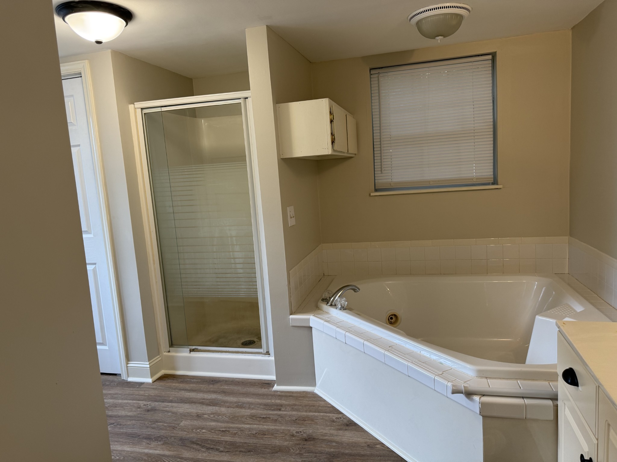428 2nd Avenue, Unit A Murfreesboro, TN 37130 - Photo 10 of 10 a bathroom with a tub and a shower