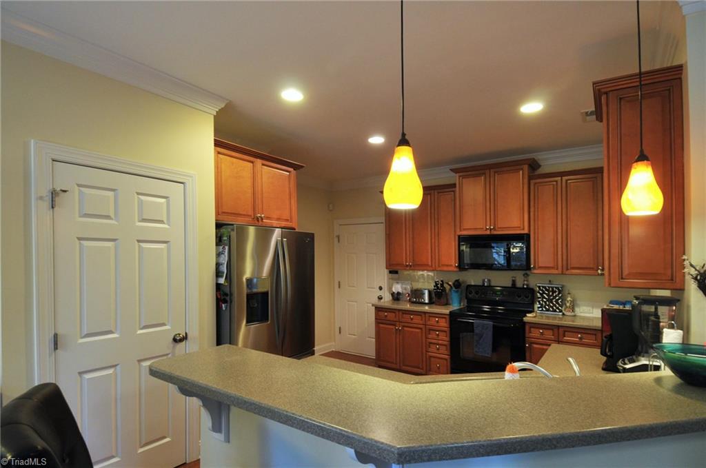 7363 Ridgecrest Trail Lewisville, NC 27023 - Photo 6 of 20 Lovely kitchen which opens to den