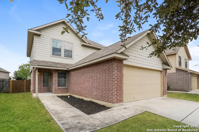 a front view of house with yard