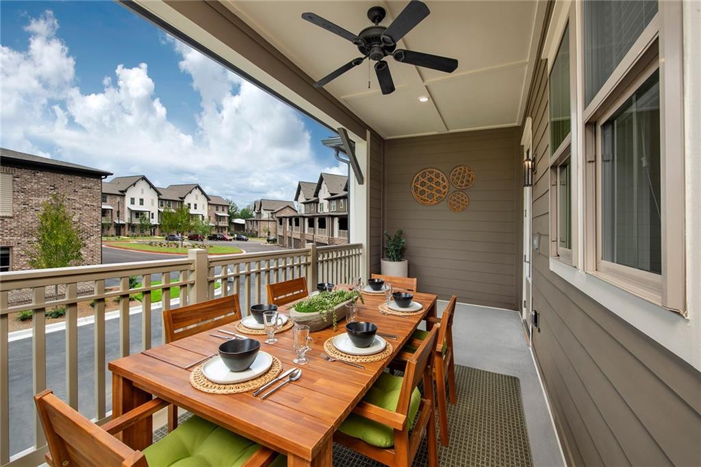 1545 Whitemarsh Road, Unit B1 Kennesaw, GA 30152 - Photo 45 of 46 a view of a balcony dining area with furniture